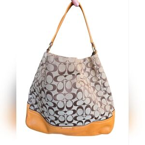 Coach Park Signature Hobo Shoulder Bag model number F23279. 
